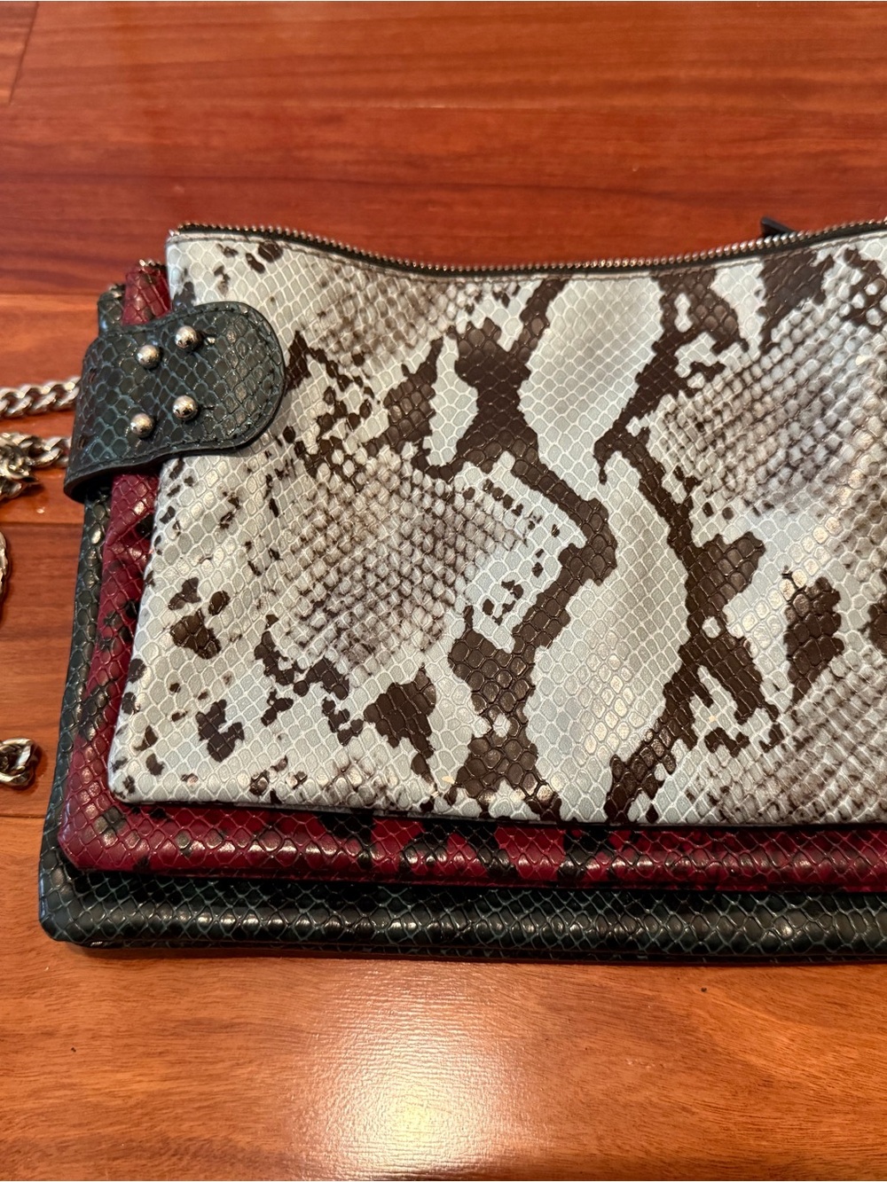 ZARA Snake-Embossed Clutch Trio in Light Grey, Green and Red.
